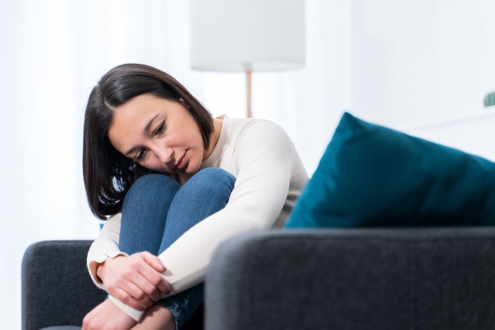 sad-woman-sofa-abandonment-trauma.jpg