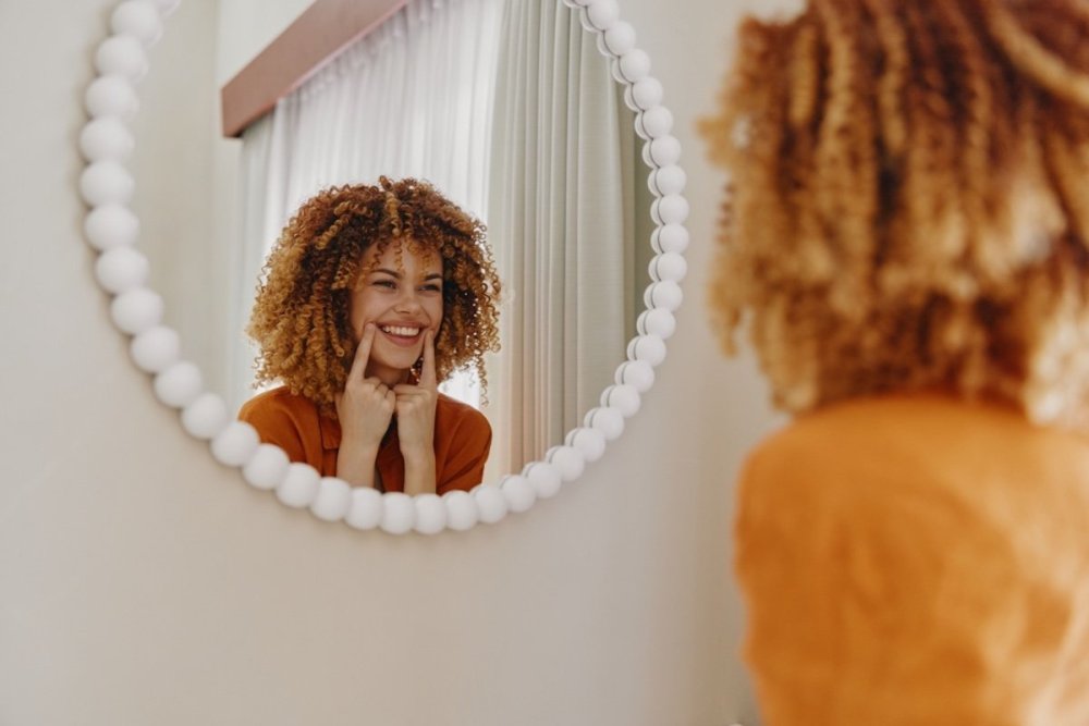 women-putting-herself-first-smiling.jpg